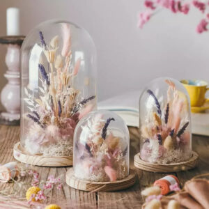 Glass dome with stabilized flowers